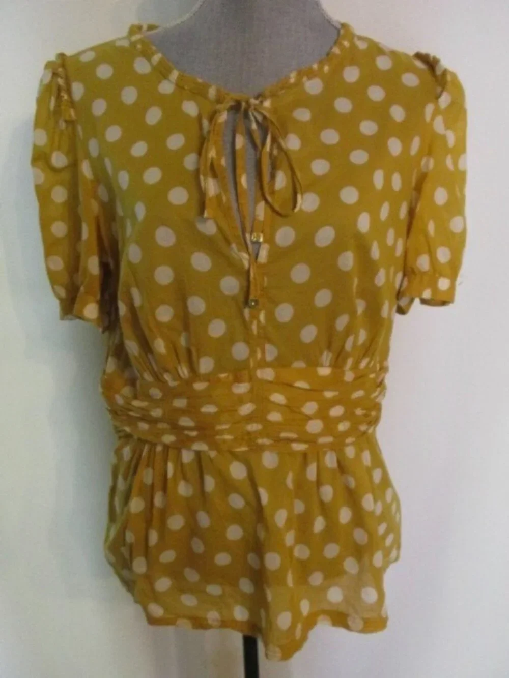 Tory Burch antique brass